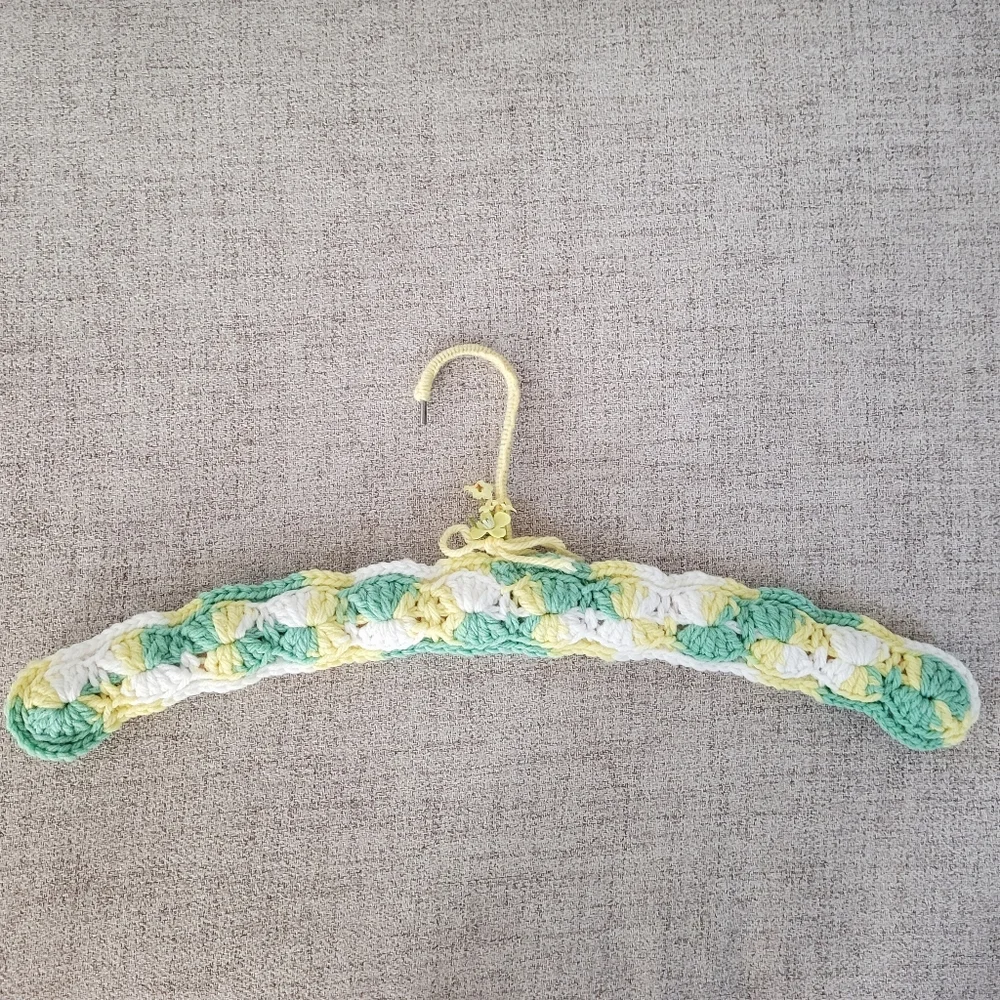 Vintage handmade knit clothing hanger